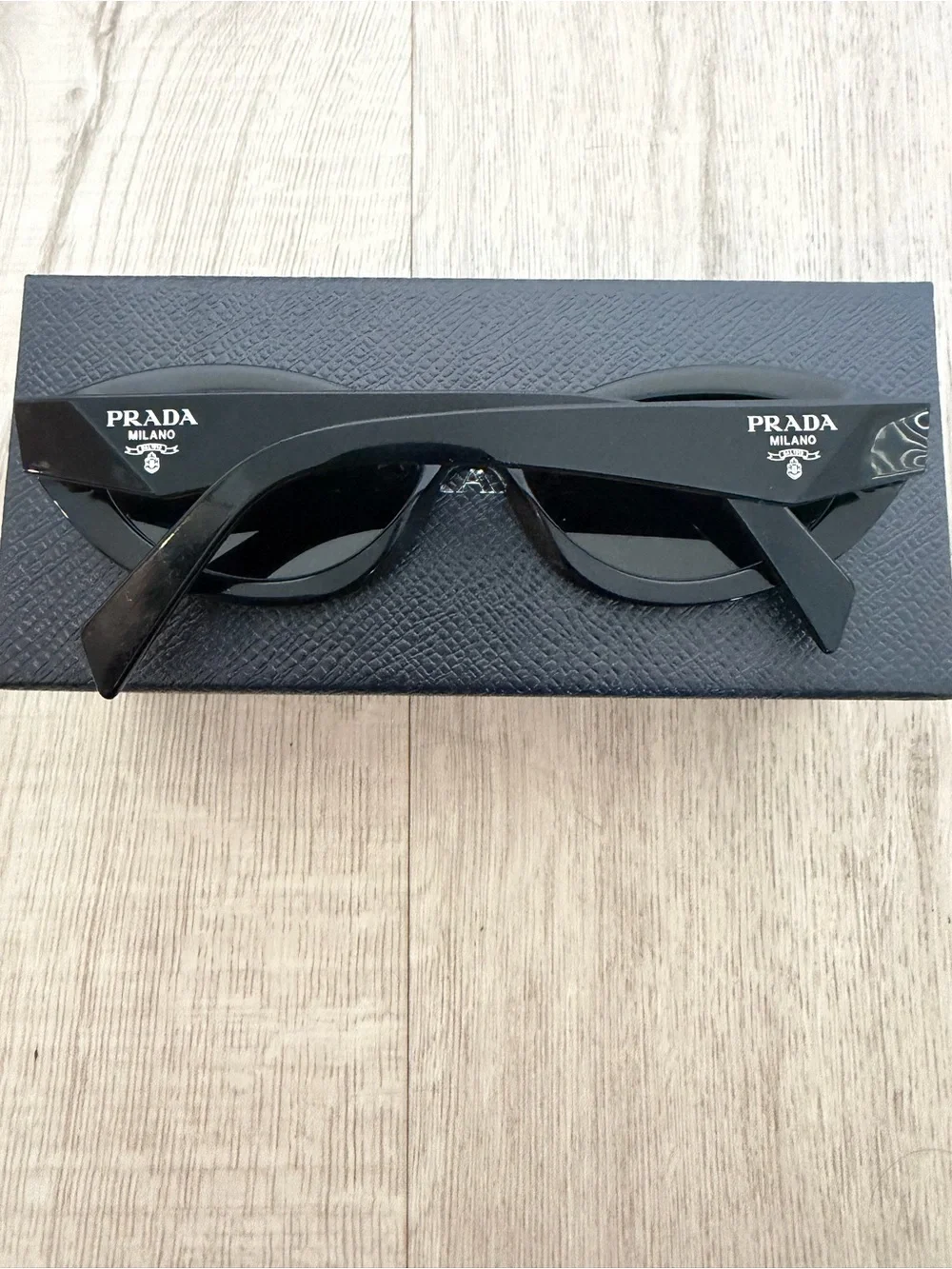 Prada Symbole Black Oval Sunglasses